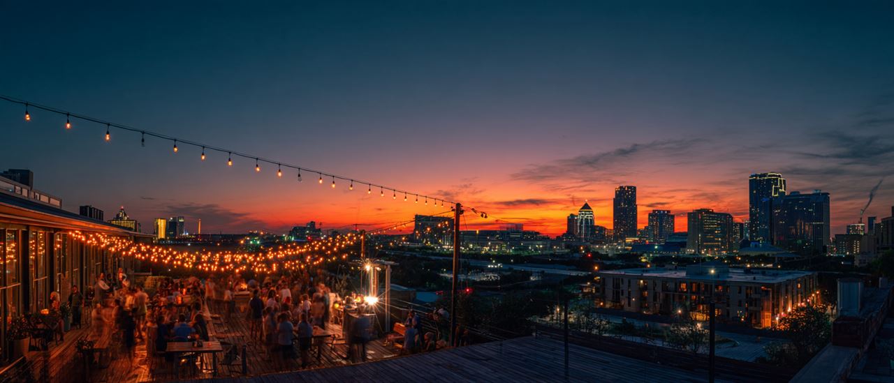 Dallas skyline at sunset from a rooftop